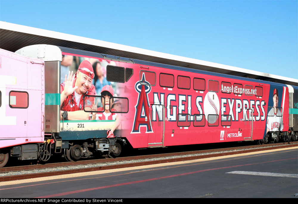 Metrolink Rotem coach SCAX #231 with ad wrap.